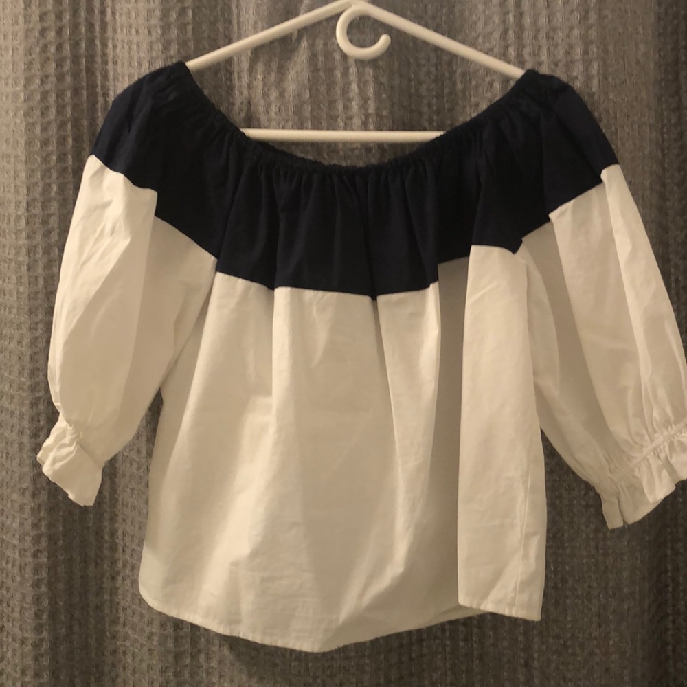 Anthropologie’s Maeve navy + white blouse